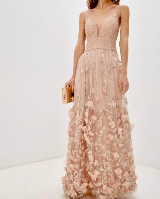 Vestito elegante con profonda scollatura V e dettagli di fiore sull'orlo